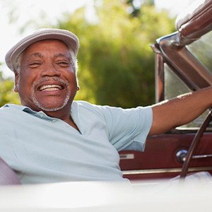 Man pleased with his implant dentures